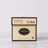 Black box of Golden Light wellness tea sachets with Smith shield in center of box.